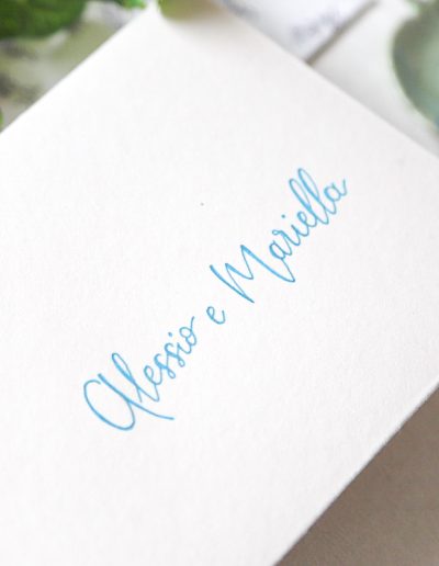 Buste matrimonio artigianali scritte a mano con fiocchi in seta